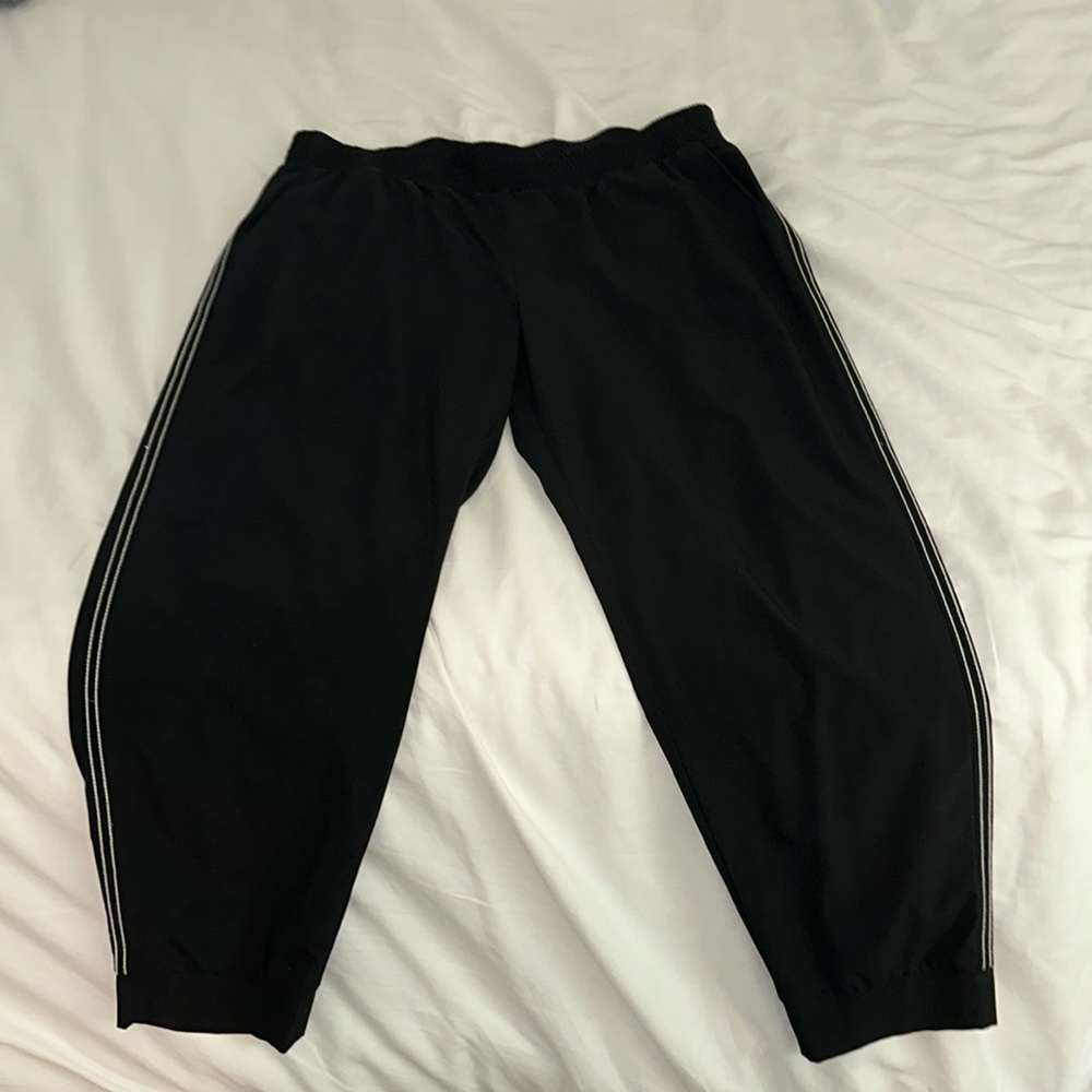 Gently used black and white pinstripe swoosh joggers from Banana Republic